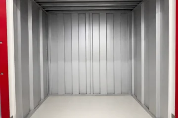 Clean and empty lower self-storage locker with metal interior at EBC Lifestyle Hub Singapore.